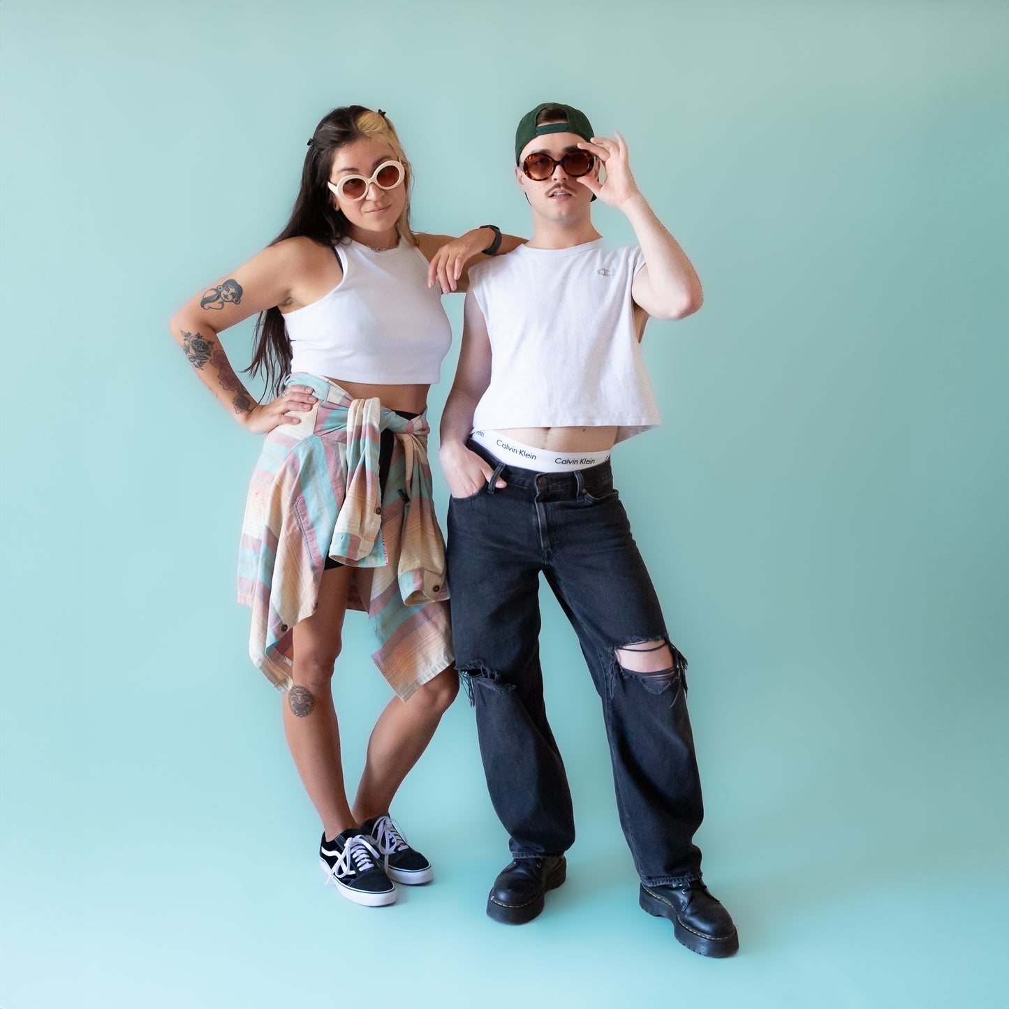 Models wearing the tortoise and ivory versions of the Frances sunglasses.