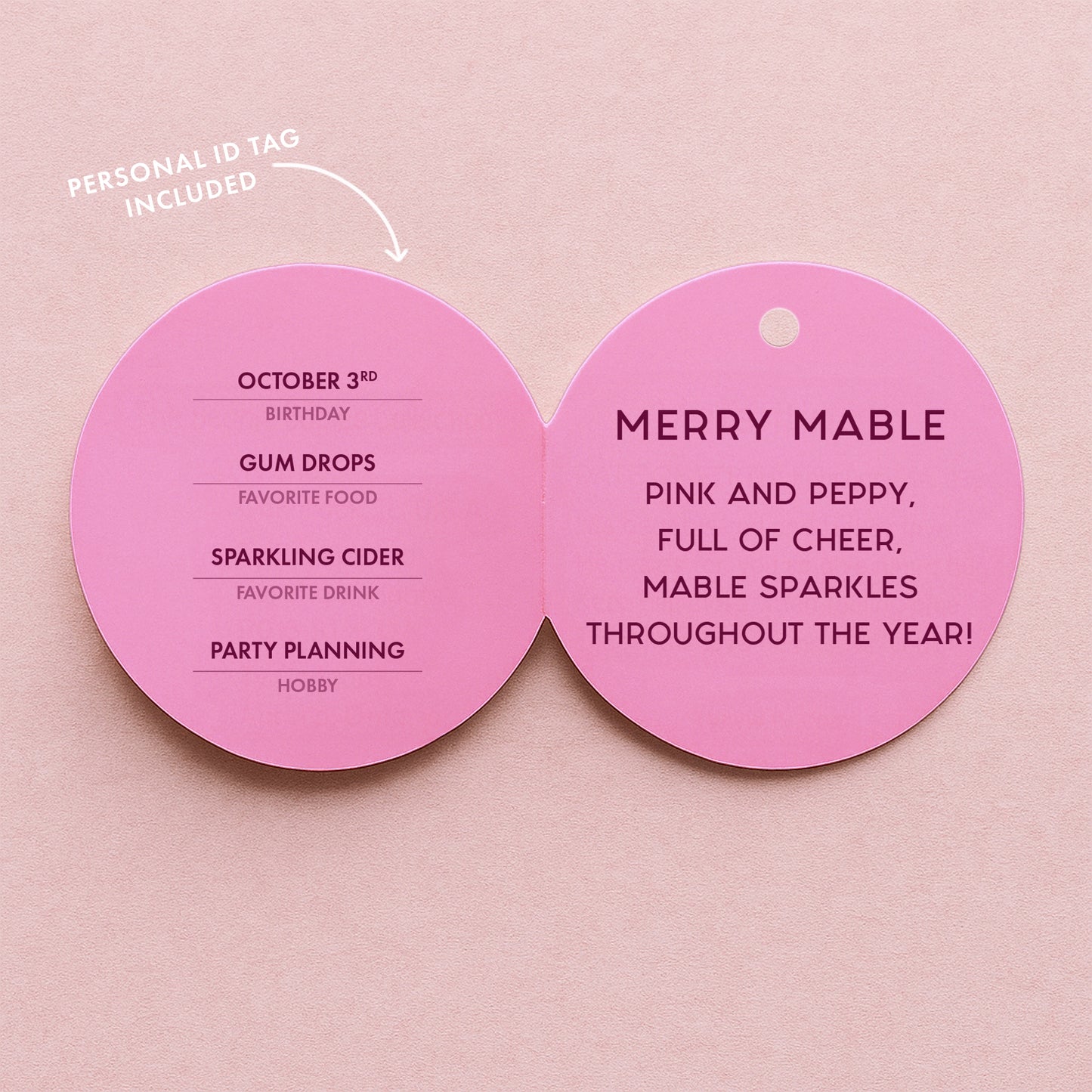A pink label that reads, 'Merry Mable pink and peppy, full of cheer, mable sparkles throughout the year!'.
