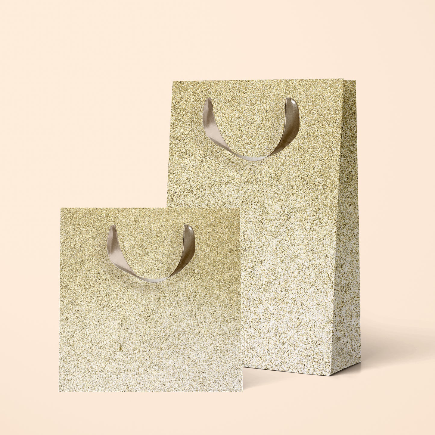 Gold sparkle gift bags in two different sizes.