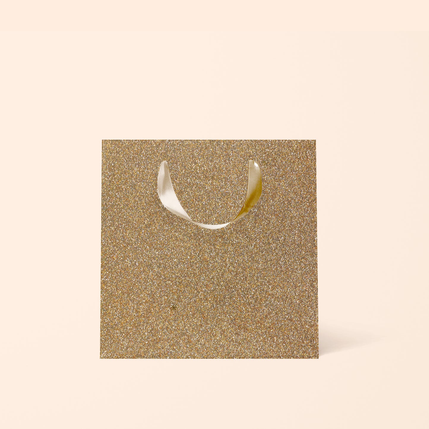 A gold sparkle gift bag.