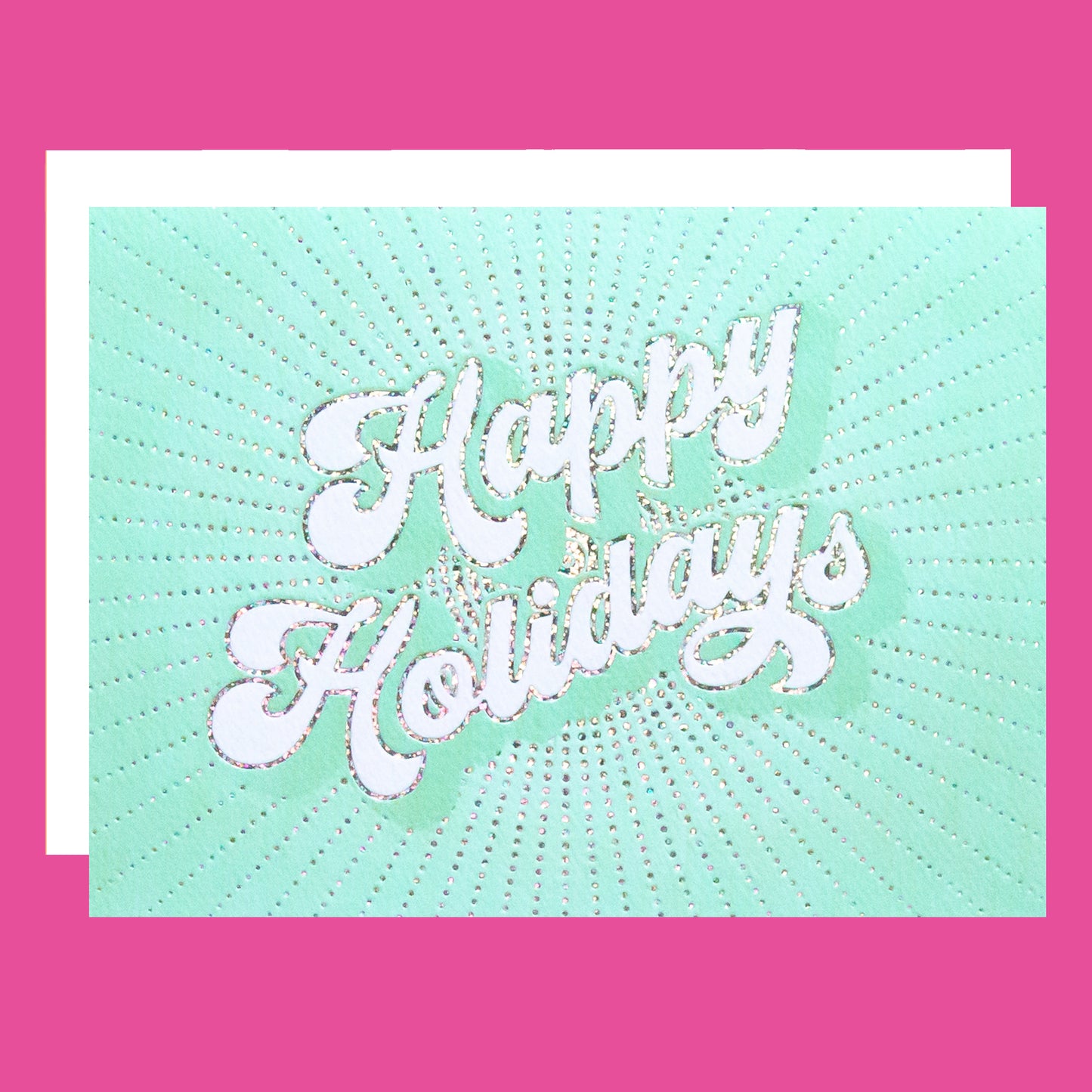 On an pink background is a teal holiday greeting card with white text that reads, "Happy Holidays" along with a coordinating white envelope.