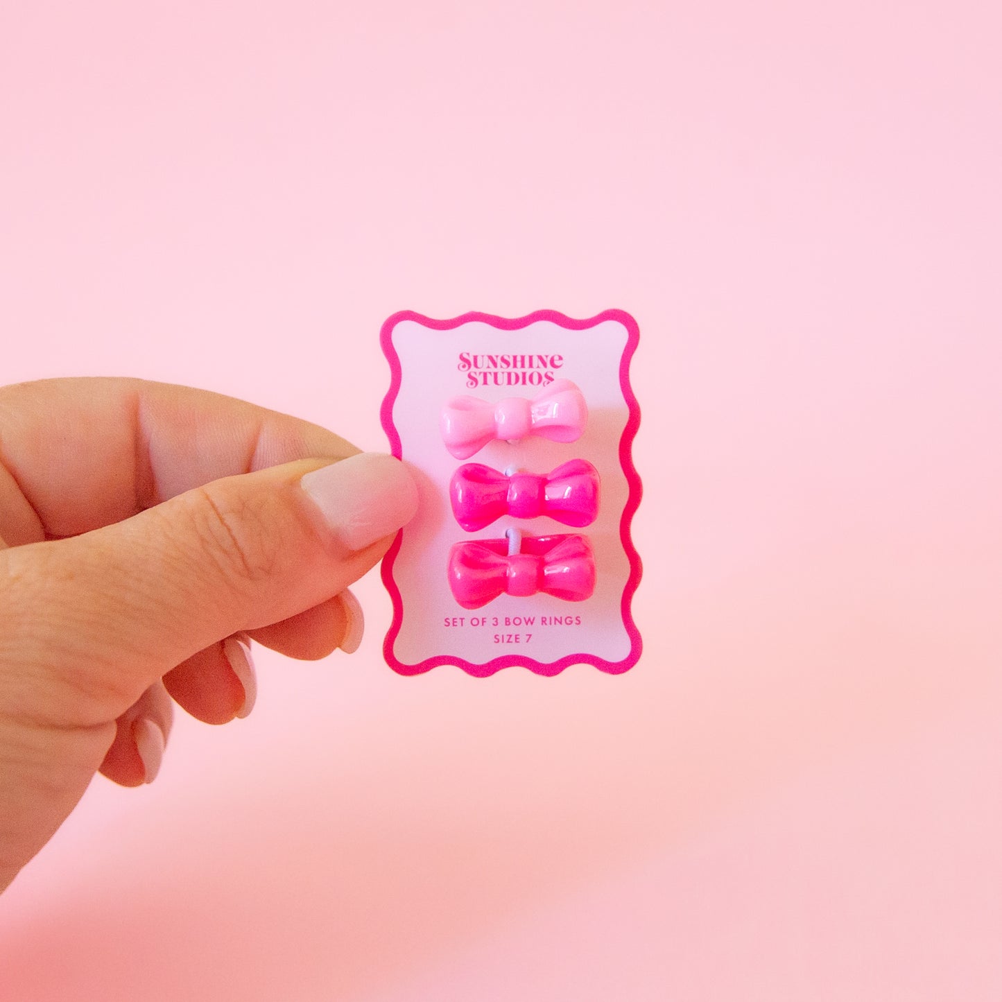 set of three pink bow rings