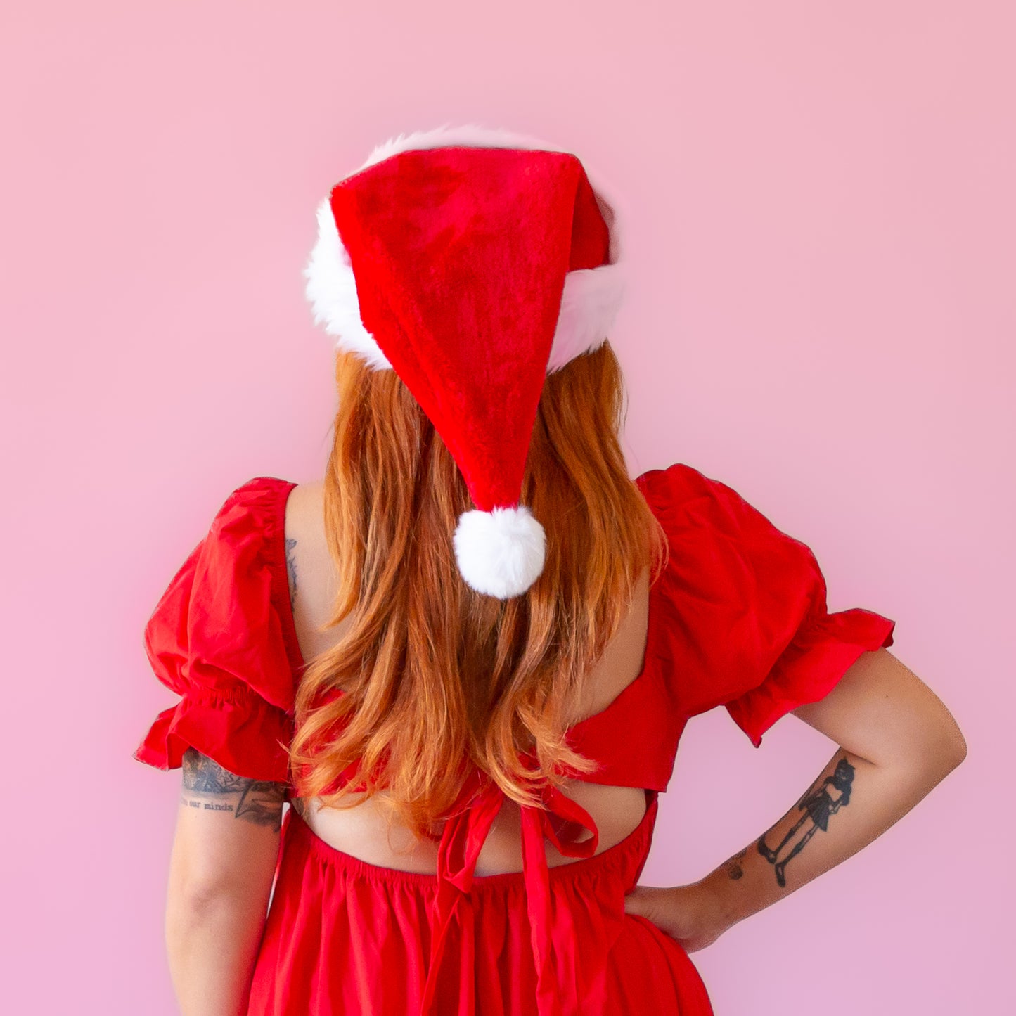 A red Santa hat with white accents and faux fur.