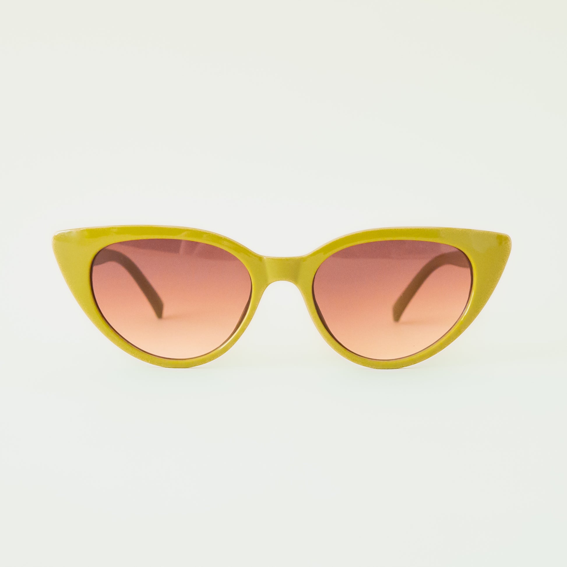 A green pair of cat-eye shaped sunglasses with a brown lens.