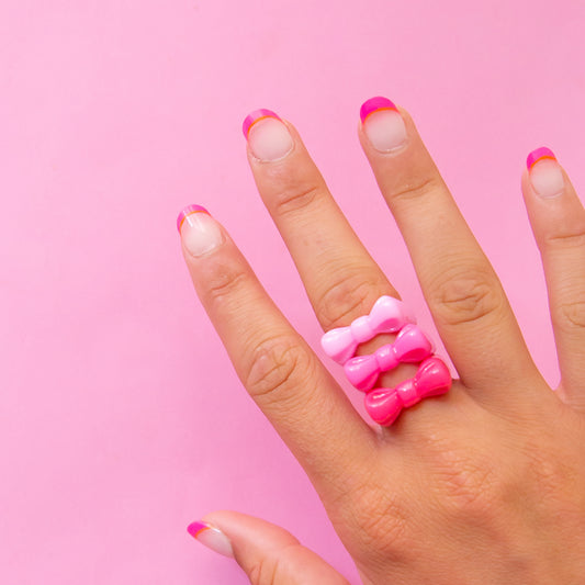 set of three pink bow rings