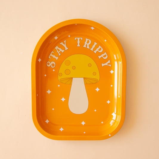 orange yellow metal tray with a mushroom design