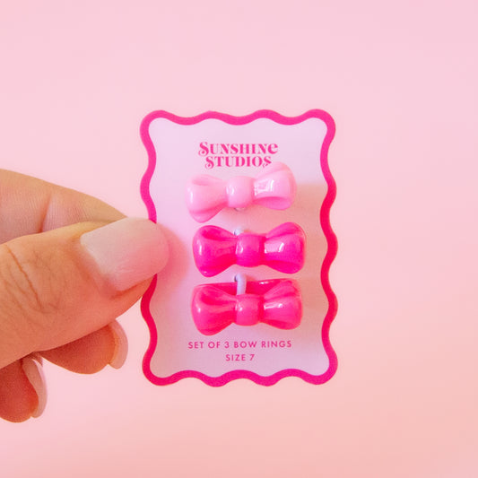 set of three pink bow rings