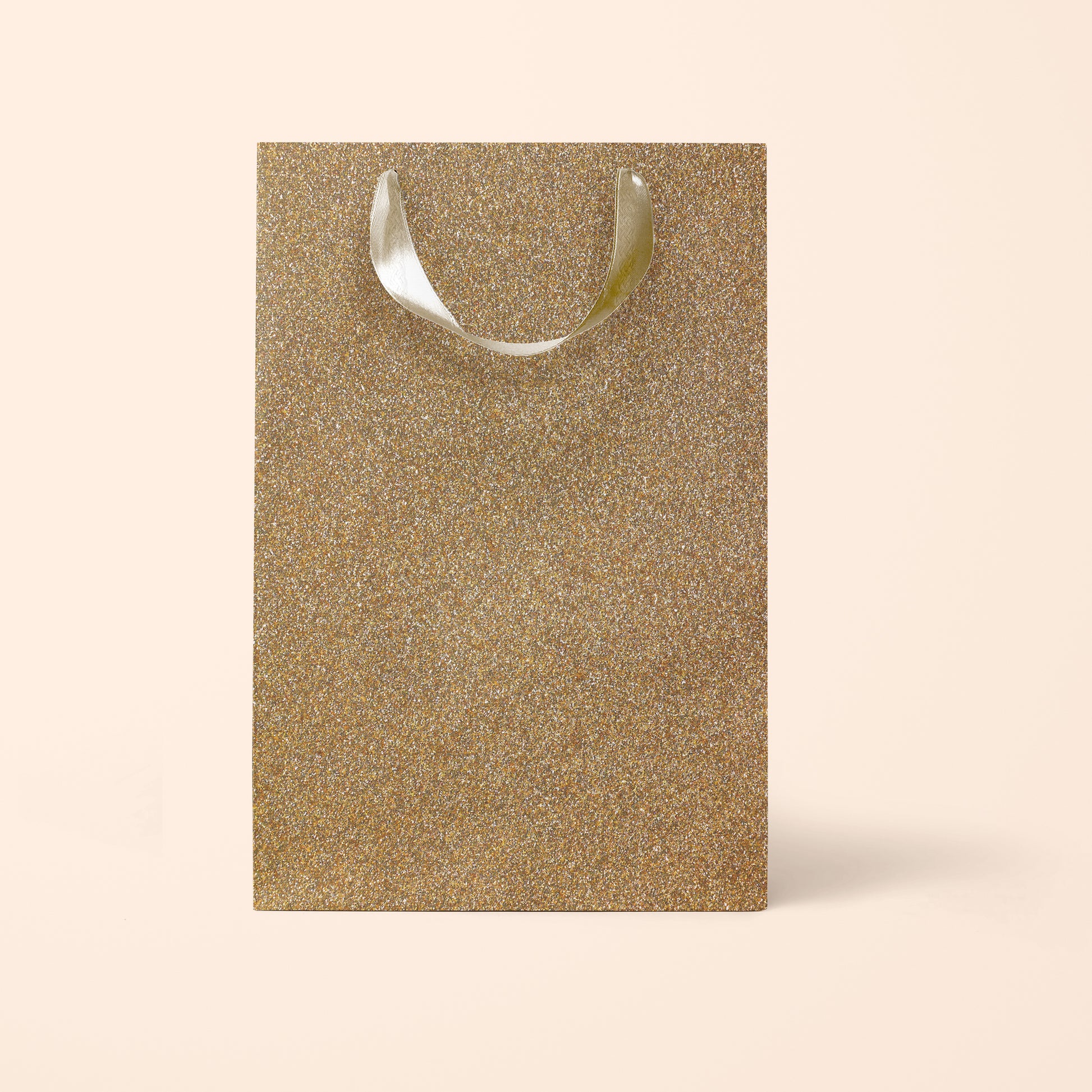 A gold sparkle gift bag. 