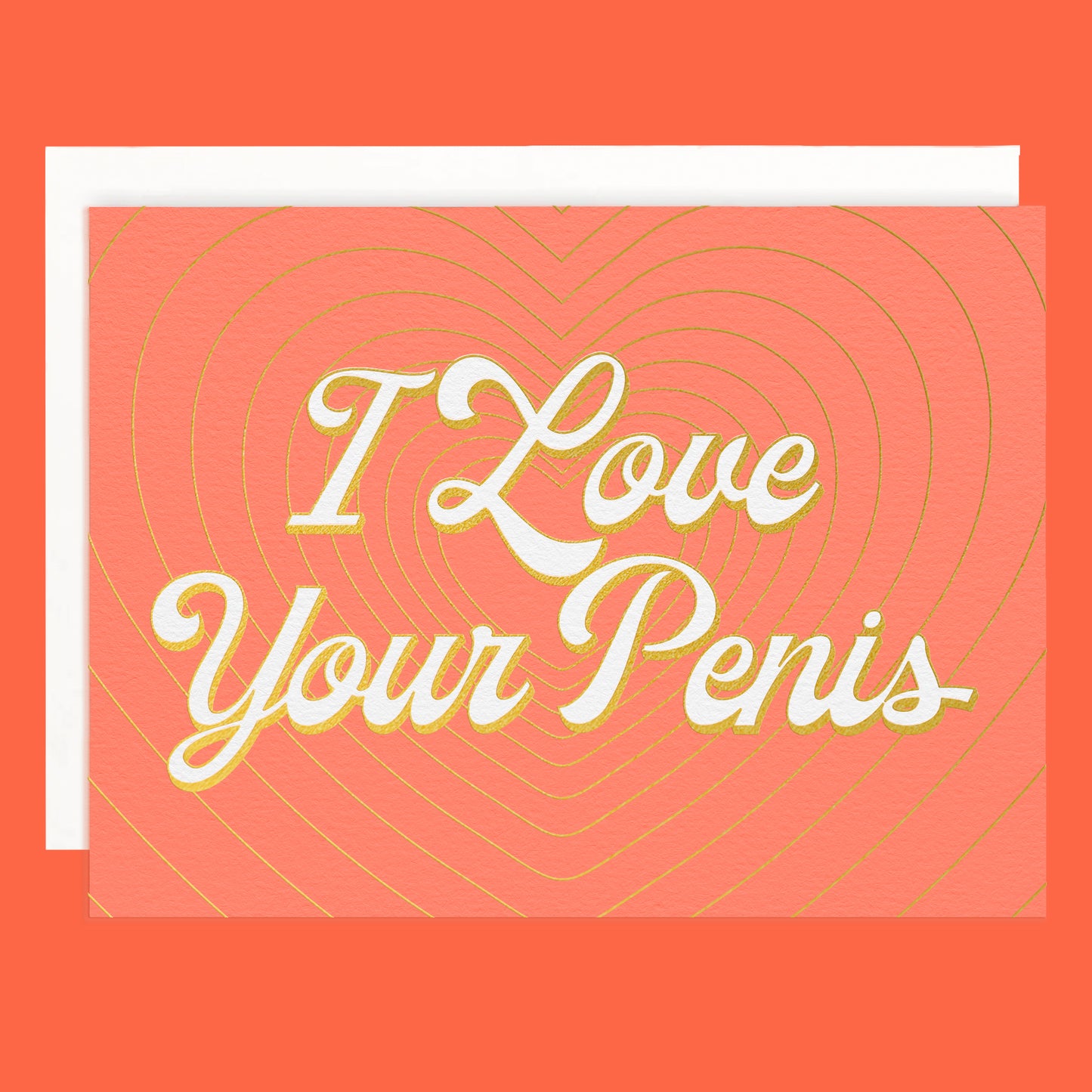 On a peachy background is a peachy colored card with layered gold foiled hearts and ivory text that reads, "I Love Your Penis" along with a white envelope.
