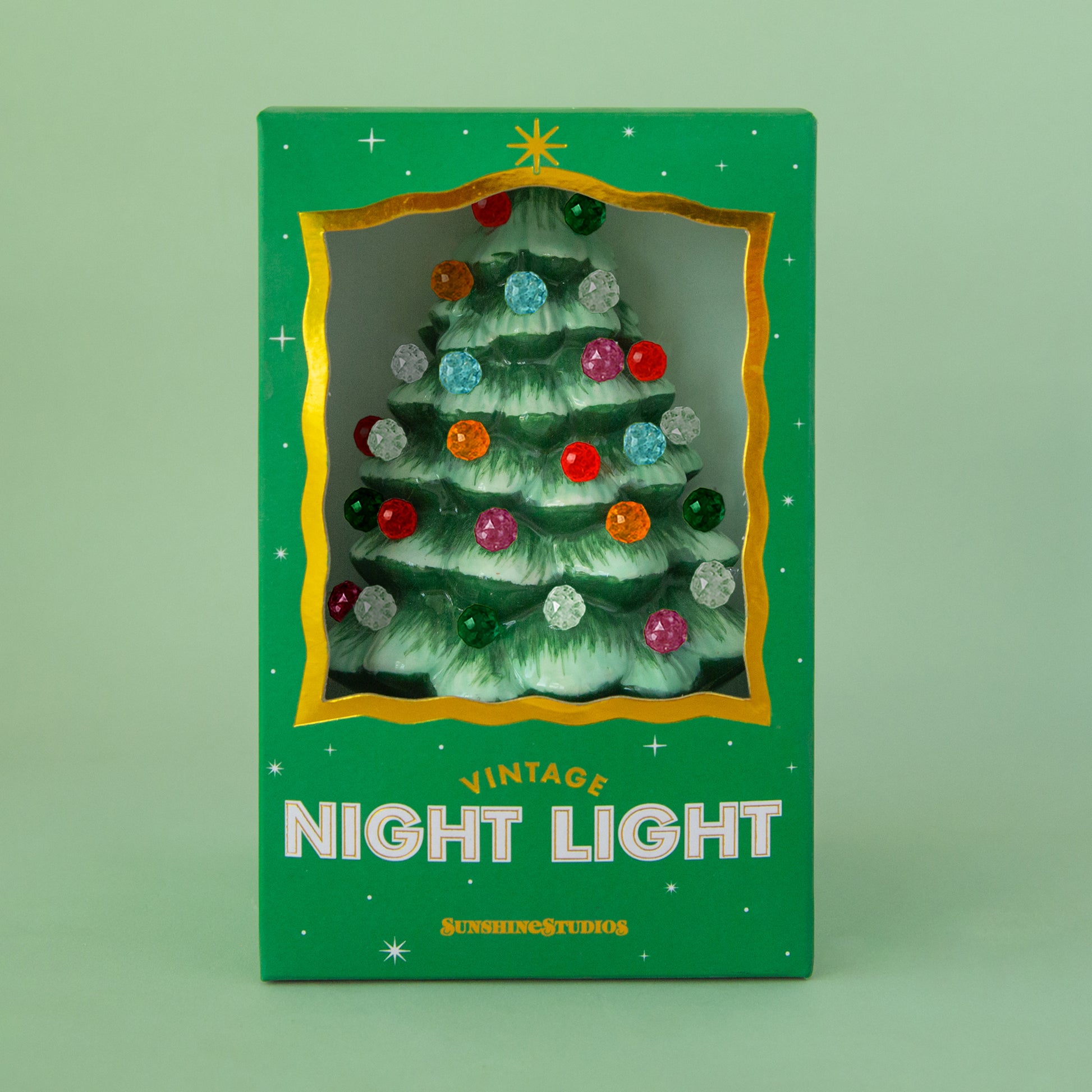 Forest green christmas tree night light with multi colored round bulbs in a decorative box. 