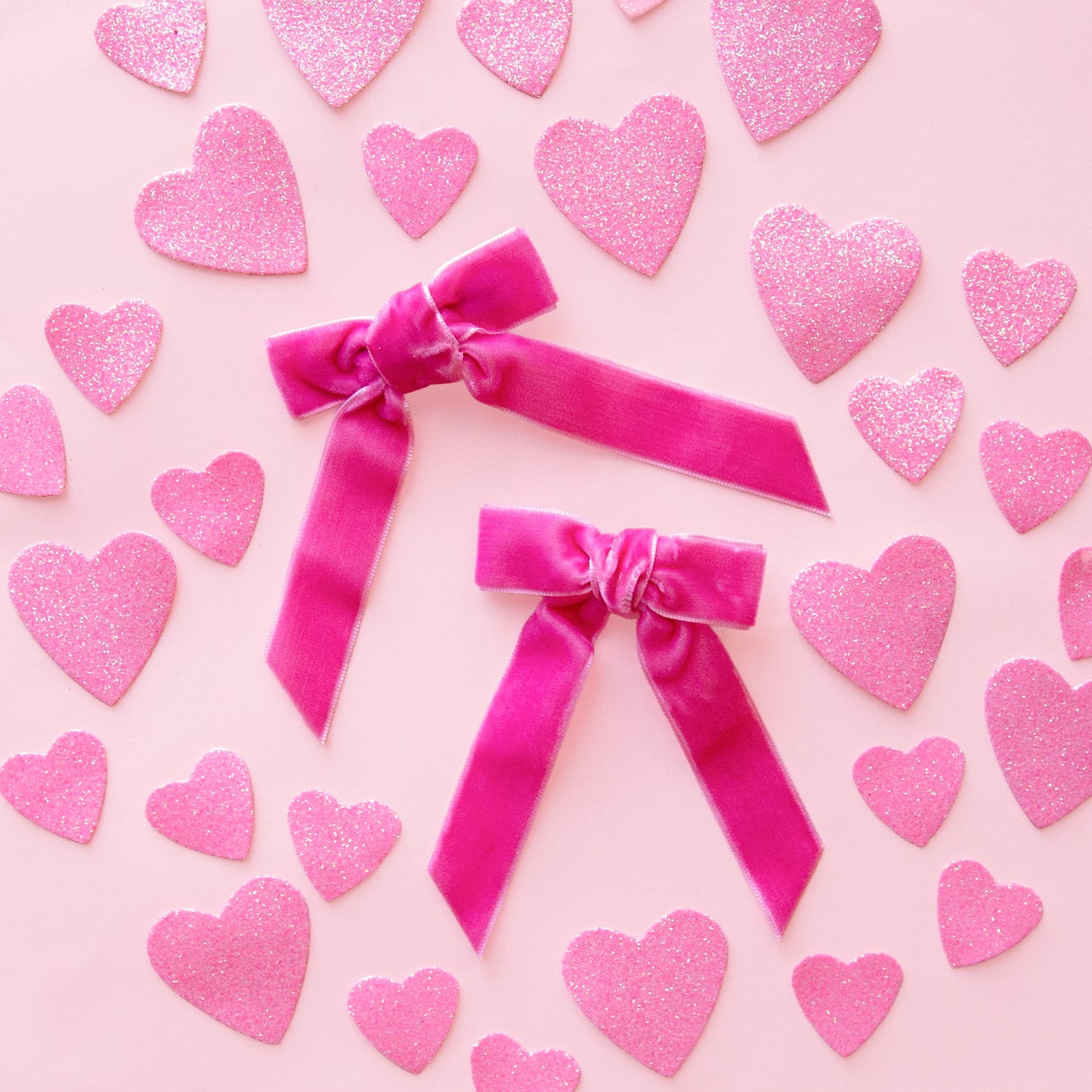 A pink set of hair bows. 