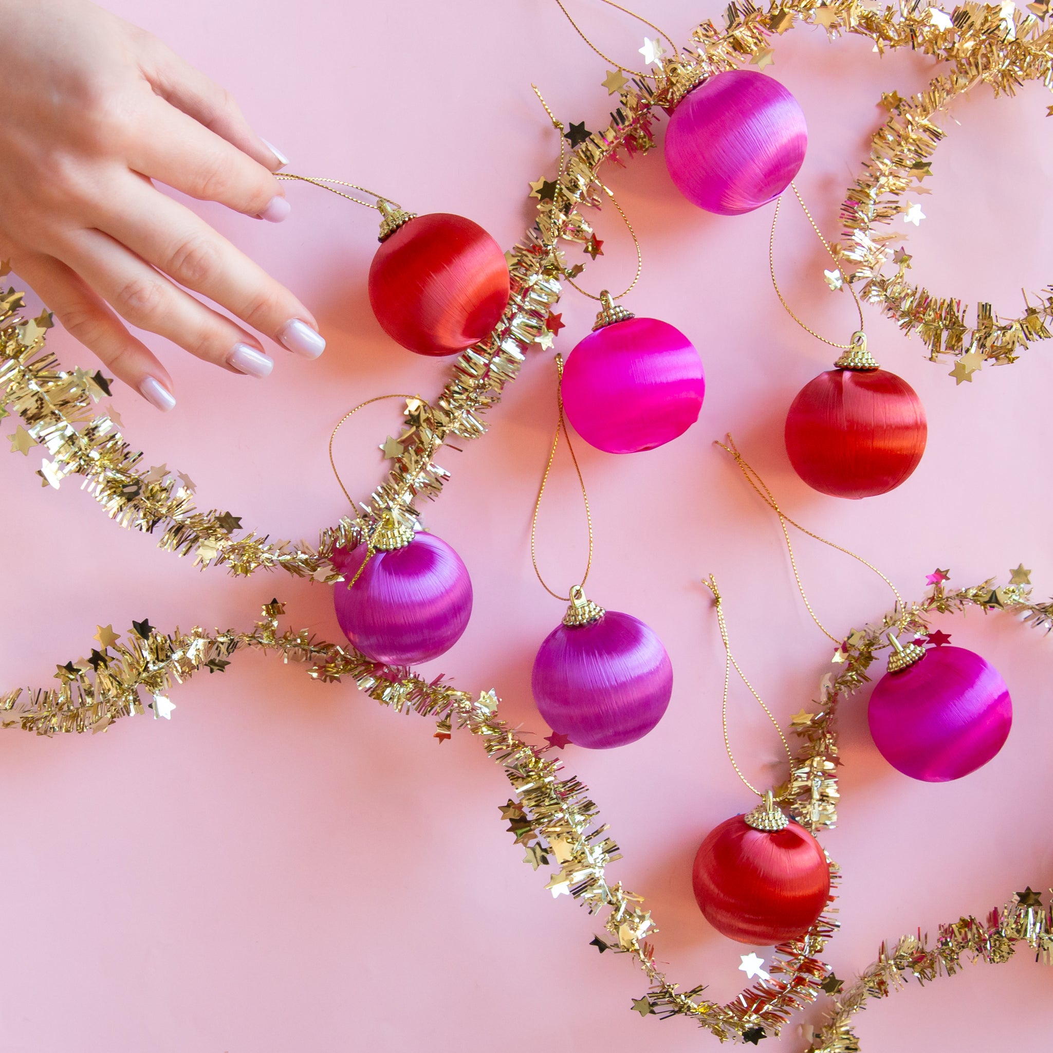 Satin and gold pink and orange ornaments. 