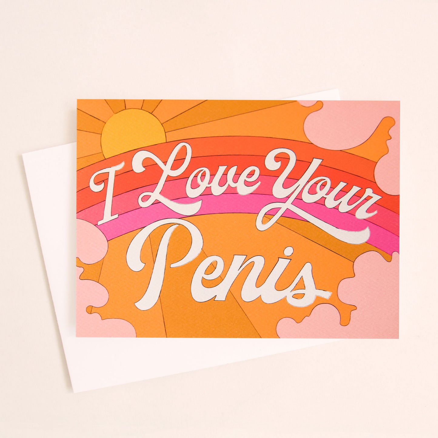 Card with a vibrant scene of a rosie toned rainbow and beaming yellow sun. Soft pink cloud take up the edges. The center of the card reads 'I love your penis' in white cursive lettering.