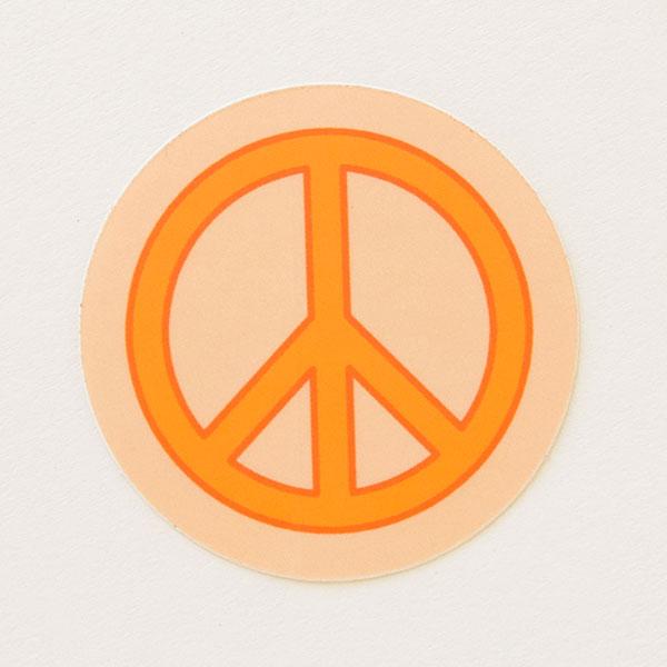 Soft orange peace sign sticker with bright orange symbol.